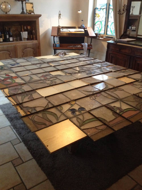 De puzzel, glasraam Art-nouveau